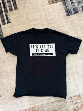 Unisex Black Graphic Tee - "It's Not You It's Me"